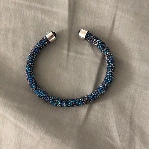 Swarovski bracelet.